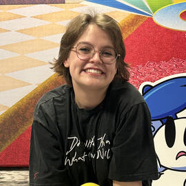 Picture of Amalia smiling into the camera.